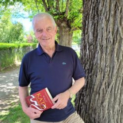 Author Robert Barclay standing by a tree
