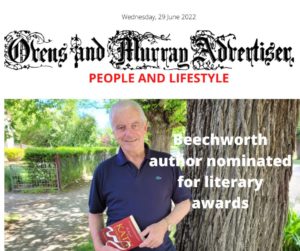 Author Robert Barclay with book standing next to tree